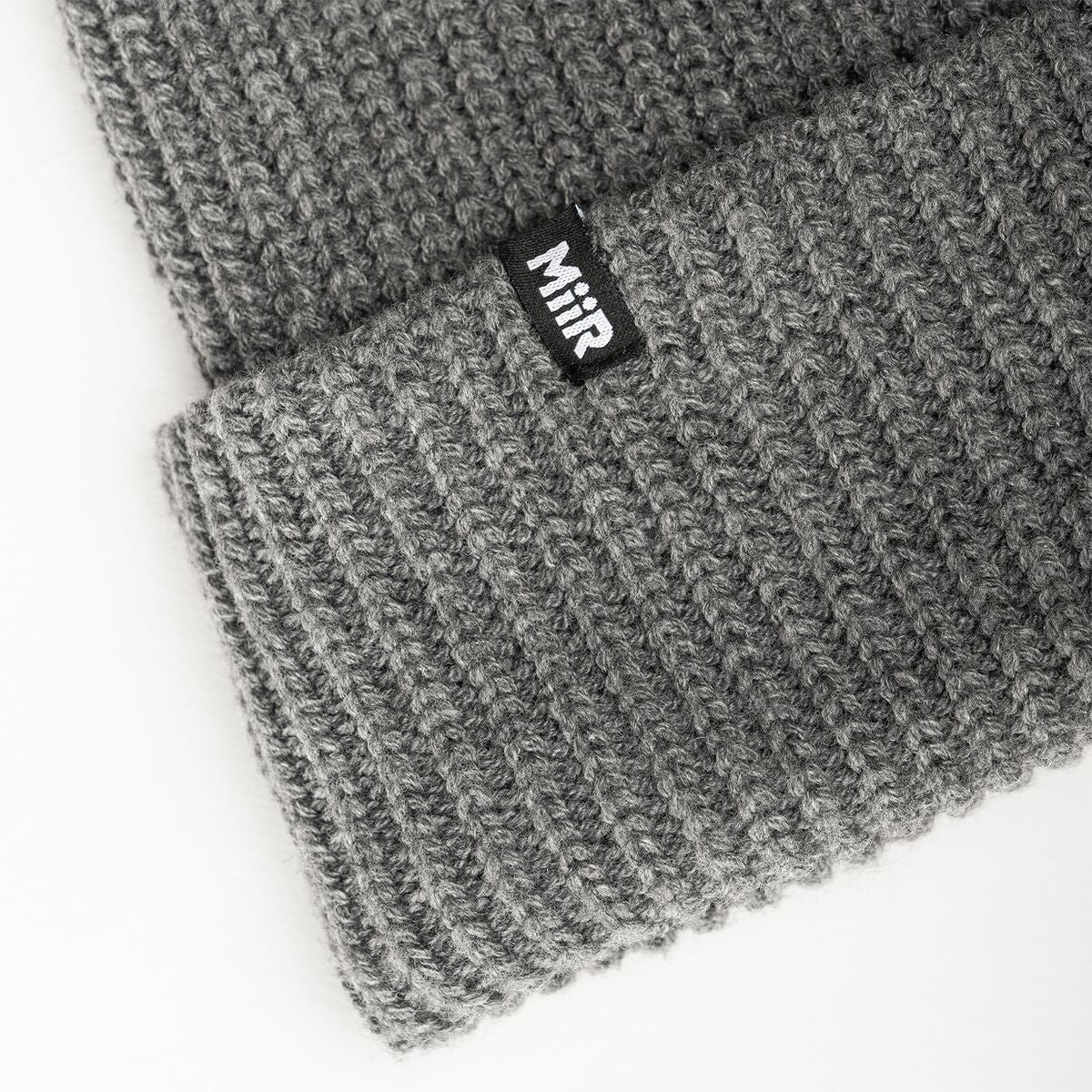 recycled-poly-rib-beanie-p0 WebPDP-RecycledPolyRibBeanie_Studio_TagDetail_GrayHeather__BNE002202OS.jpg